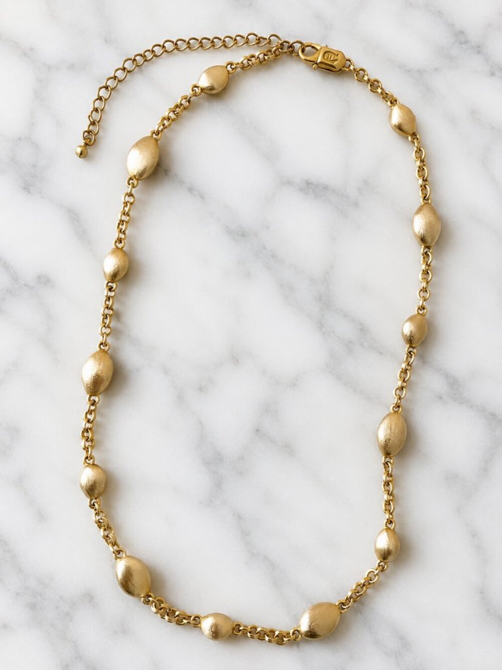 Vintage Etienne Aigner Gold Tone Textured Oval Station Necklace
